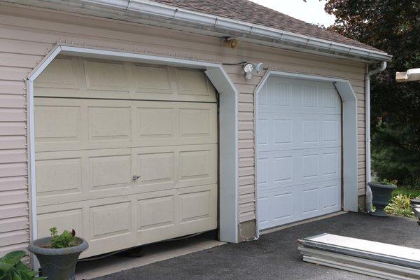 Before (right) & after (left) garage door replacement.