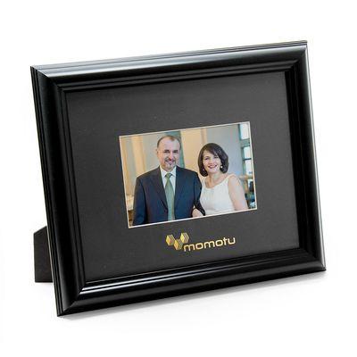 Poly frame with imprinted picture frame mat.