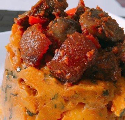 Delicious Egusi Soup with Pounded Yam