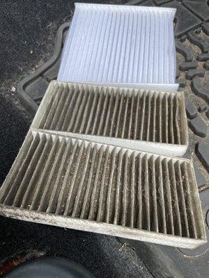 The old (bottom) and new (top) cabin air filters.