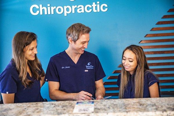 Doctor and Staff at the Front Desk