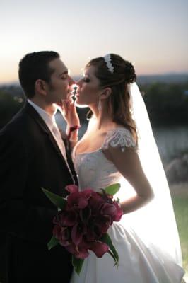 The beautiful romance between a couple on their wedding day.