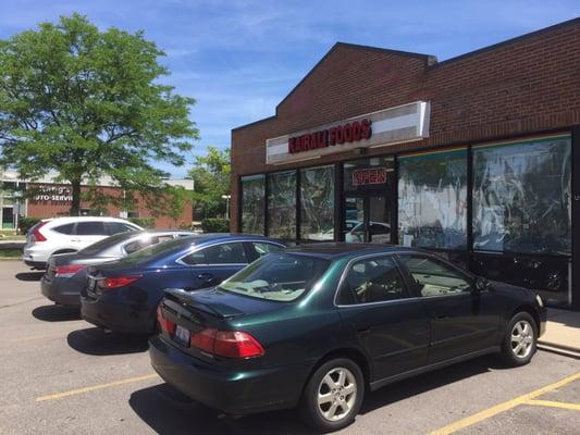 Shares the parking lot with one other store.