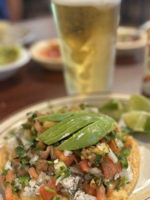 Perfect in a hot day! Just walking by and stopped in for a ceviche tostada and ice cold beer. AMAZING