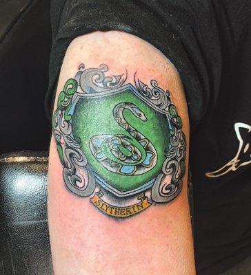 Slytherin crest, by Brandon Heuser