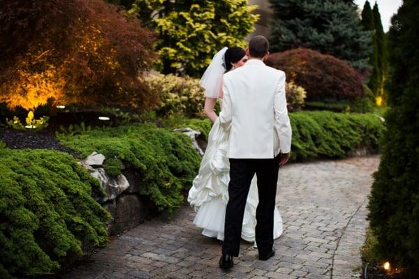 Beautiful bridal portrait in the garden area of Grand Marquis. Photo provided by Erik Umphery Photography.