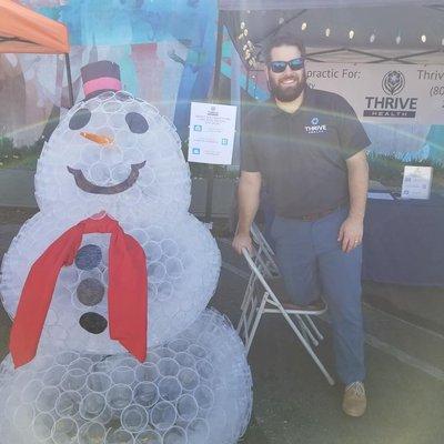 Dr Morgan Hurd with Mr 1000-cup snowman at the Holly Jolly Jubilee put on by the Lompoc Chamber of Commerce