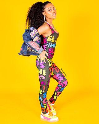 Neon Kisses Slay unitard and graffiti denim jacket