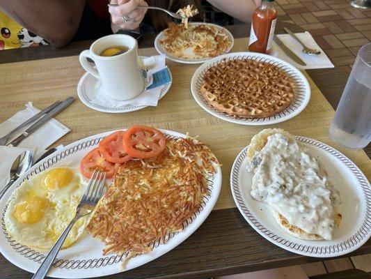 Hash browns, eggs, tomatoes, peanut butter chip waffles, biscuit and gravy... yum