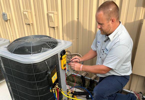 Ebens Air Conditioning - Port St Lucie Service Technician at work.