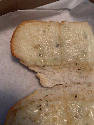 That's Garlic cheese bread! Please someone help, what is that?