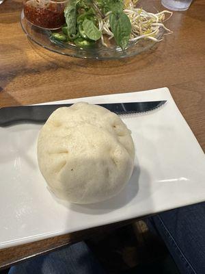 Bahn Bao (steamed bun with seasoned ground pork, sweet sausage and half hard boiled egg)