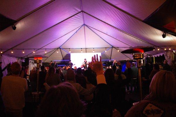 Currently meeting outside in the "big tent" rain-or-shine... this allows us to stay open consistently and safely in this season.