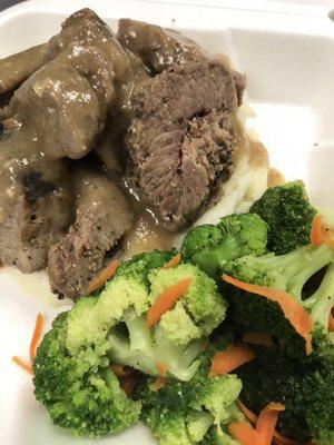 Grilled Angus Beef over Garlic Mashed Potato's and Gravy. Served with steamed mixed vegetables.