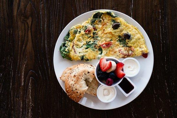 Try our GREEKO'S BREAKFAST 10.99
 Large omelette, fruit and a toasted bagel OR croissant
 -Choose Deli, Greek, Western, Veggie Omelette