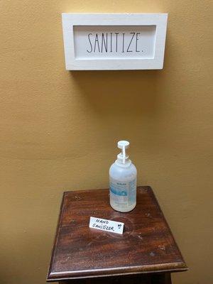 Hand sanitizer is provided, masks are still required in waiting room and social distancing is observed