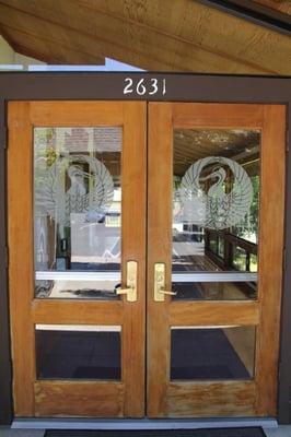 Doors into Myoshinji sanctuary.  The cranes on the doors signify Teacher (speaking on left) and Student (closed mouth on right).