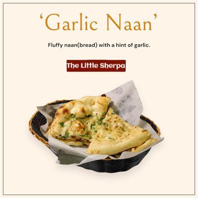 Fluffy naan(bread) with a hint of garlic.