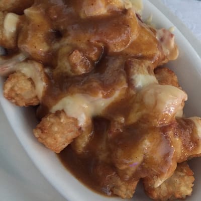 Cajun tater tots-bacon,cheese,& gravy...really,is anything bad with bacon?!