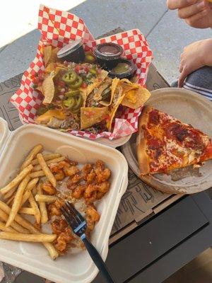 Bang bang shrimp (my son ordered this 3 times while we were there) Nachos (they were ok, but not fan of the chicken)  Pizza