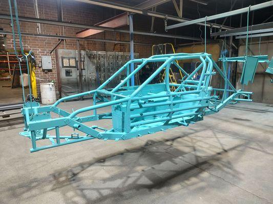 Older modified chassis, burnt off and blasted. Coated in a high gloss RAL teal !