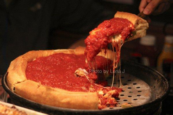 Large Chicago Stuffed Pizza w/ red onion, black olive, green pepper, jalapeños ($50.45)