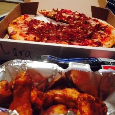 Meat pizza and buffalo wings