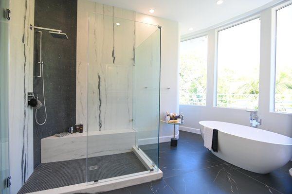 Bathroom remodel with  custom sized tile and spacious shower remodel