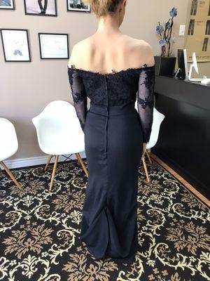 Shortened gown with train and added a bustle.