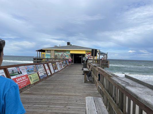 The building that Crabby Joe's is located in off the pier.