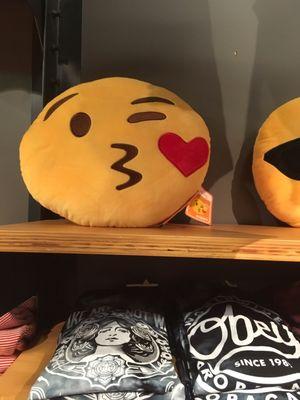 Emoji throw pillows.