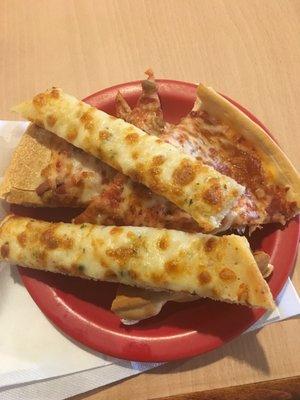 Cheese sticks and pizza piled up high!