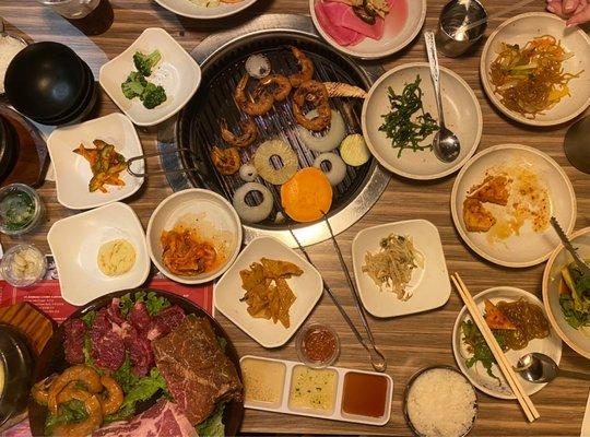 Our whole table was FILLED with meats, seafood, veggies, banchan, stew, cheese corn, and more!