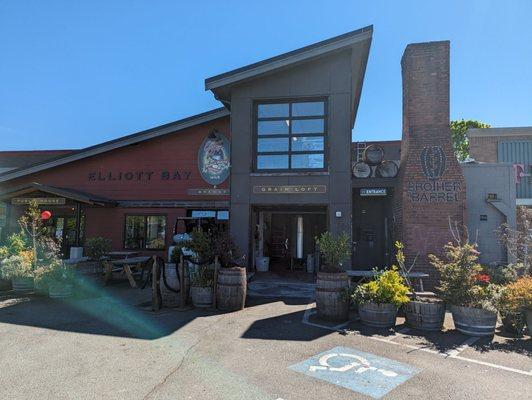 Rachel's is inside Elliott Bay Brewery.  Entrance to the left of the big brick smokestack.