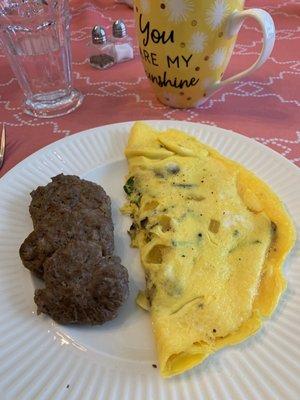 Main course for breakfast: sausage and a custom-made omelet!