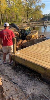 Buck's Wrecker Service takes care of all our business needs. They recovered our John Deere trackhoe from this job.