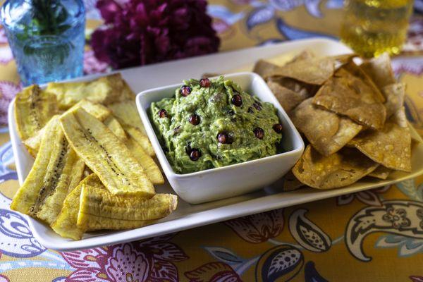 Guacamole with plantain chips and tortilla chips