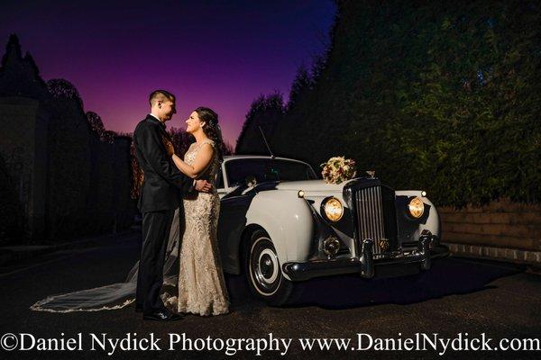 Sunset portrait with their classic limo. www.danielnydick.com NJ Wedding Photography