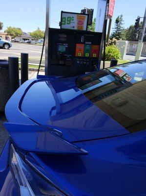 The only parking space in the shade was at a fuel pump.  (and no one was getting gas)