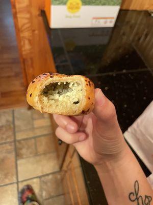 Burnt or old  (can't tell but either way disgusting) Chive and onion bagel mini