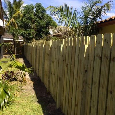 Tight privacy wood fence