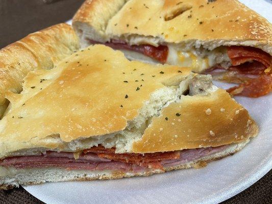 Their "take and bake" Calzones are huge and sooo good!