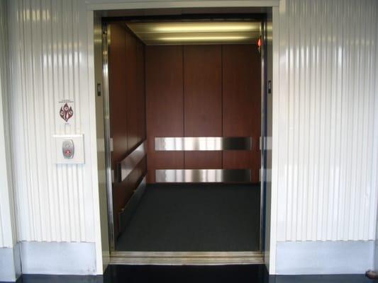 Large freight elevators located at both entrances to the facility.