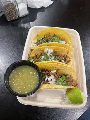 Street tacos are delicious! The green salsa is definitely full of flavor.