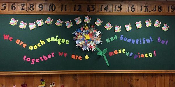 This was my favorite Welcome Back board. The flower was made up of all of their hands that they traced and cut themselves. :)