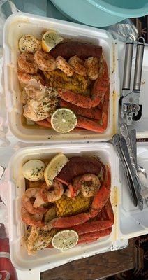 $35 special, 1crab, shrimp, sausage, corn, potatoes and an egg x2 , choose your own butter flavor, top is Cajun bottom is honey garlic