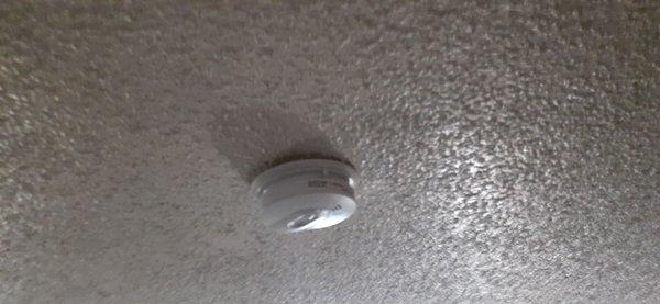 Fire detector that was loss and starting to fall off