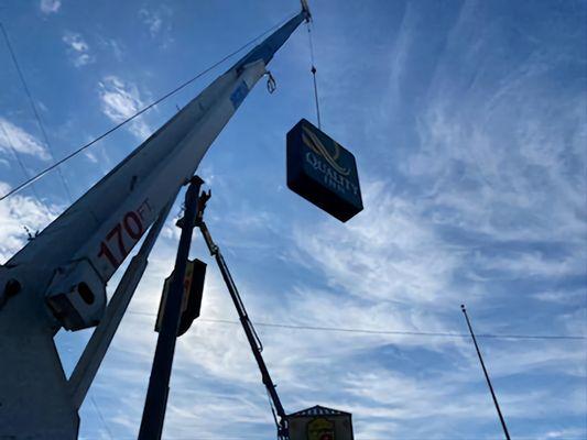 Refurbishing a large Quality Inn sign with new faces and upgraded LED lighting.