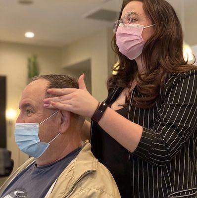 Shannon freshening up her dad.