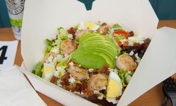 Healthy and delicious, Seared shrimp salad with avocado, hard-boiled egg, tomato, blue cheese & honey mustard dressing